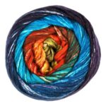 Top view of cake of Cumulus Rainbow yarn in colorway 213 - Island Coast