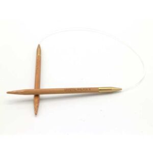 A 16 inch bamboo circular needle on a white background