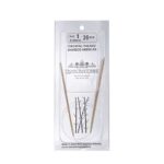 A size 1, 26 inch bamboo circular needle in its silver packaging