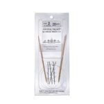 A size 2, 26 inch bamboo circular needle in its silver packaging