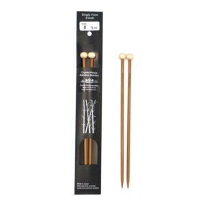 Two sets of 9 inch bamboo straight needles, one in black packaging on the left and the other set out of the packaging on a white background