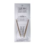 A size 4, 16 inch bamboo circular needle in its silver packaging