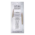 A size 7, 12 inch bamboo circular needle in its silver packaging